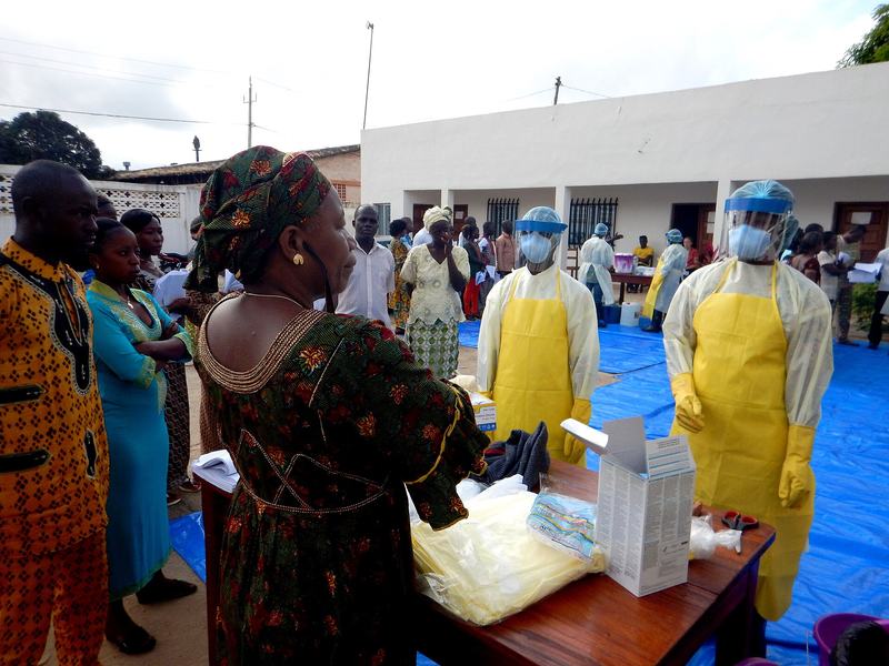 Health workers in protective suits during Ebola care training