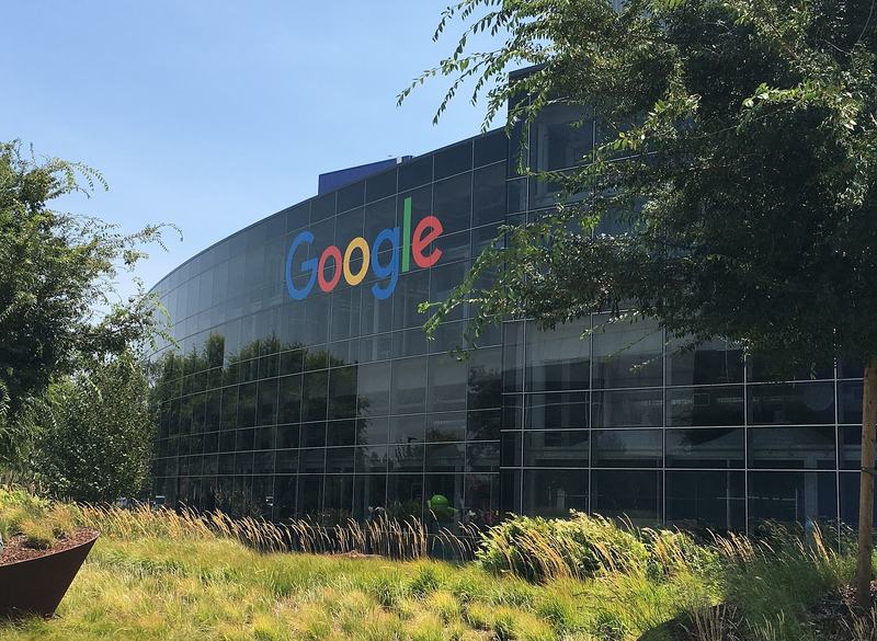 The Google logo on a glass building at the Googleplex in Mountain View, California